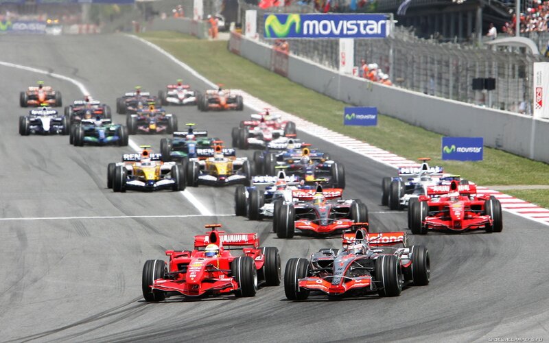 Formula 1 race cars on track