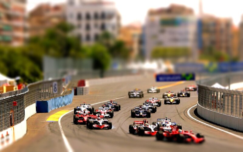 Formula 1 race cars on track