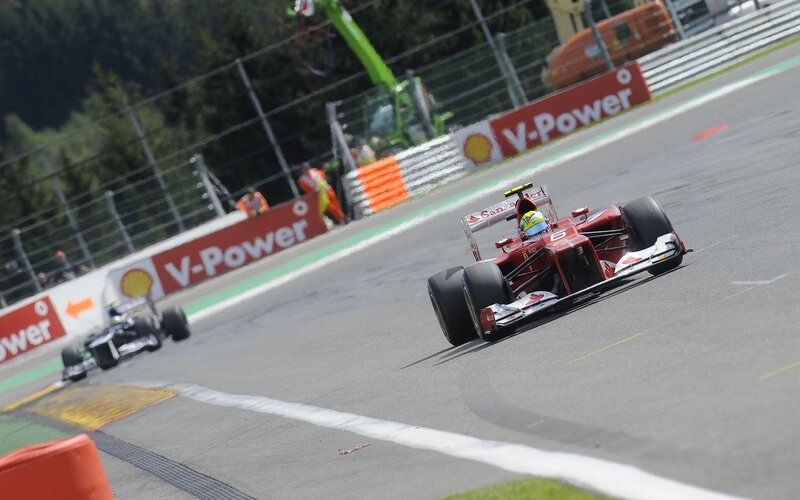 Formula 1 race cars on track