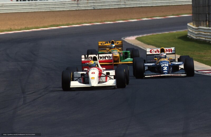 Formula 1 race cars on track