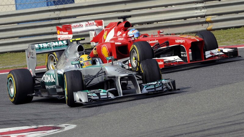 Formula 1 race cars on track