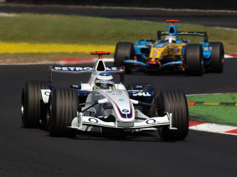 Formula 1 race cars on track
