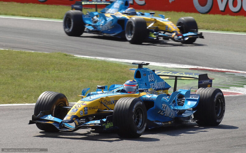 Formula 1 race cars on track