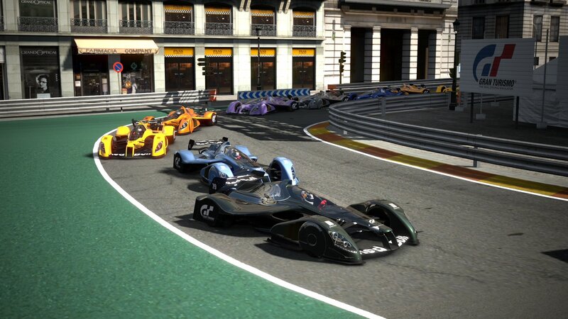 Formula E race cars on track