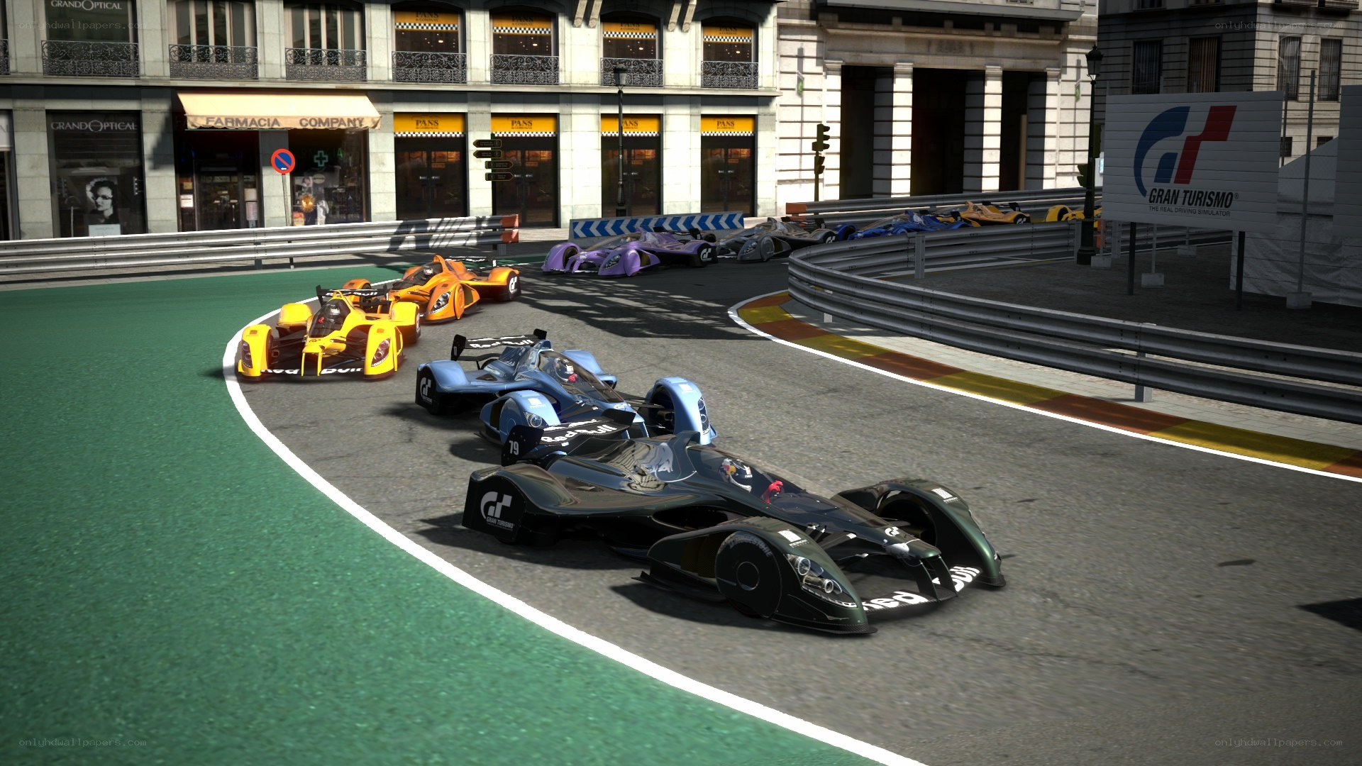 Formula E race cars on track
