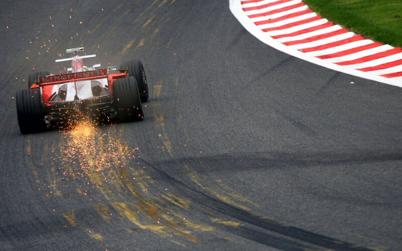 Formula One Car — Black, Dynamic, Photograph, Sparks