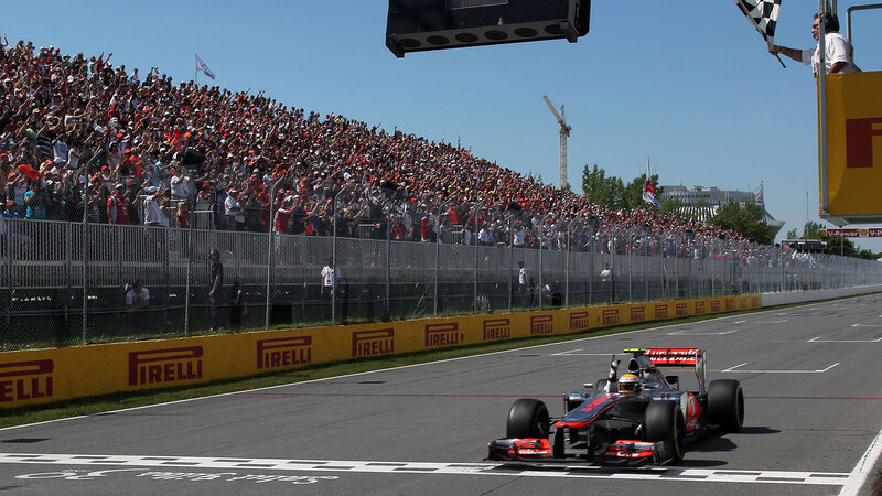 Formula One Car Crossing Finish Line — Black, Excited