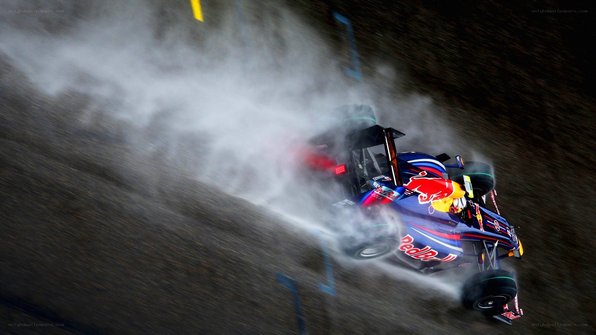 Formula One car drifting in rain