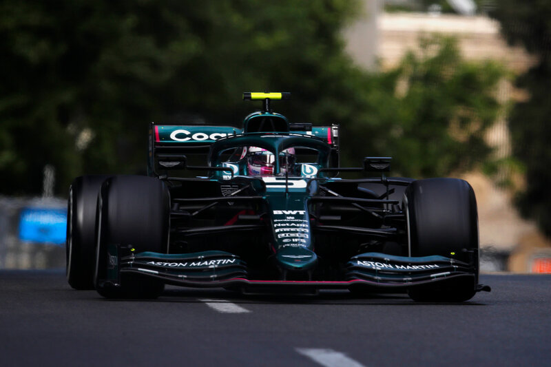 Formula One Car — Green, Dynamic, Afternoon