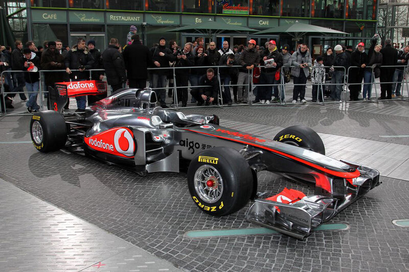 Formula One Car on Display — Silver, Public Event