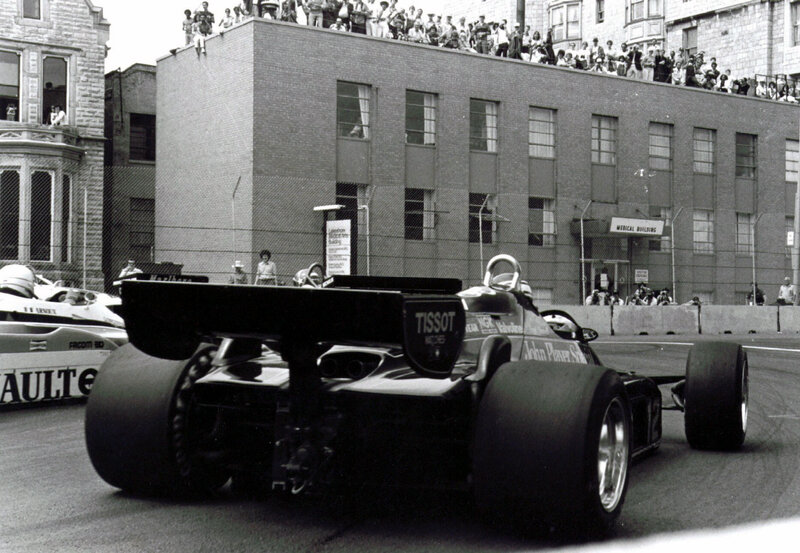 Formula One Car on Track — Black, Active, Afternoon