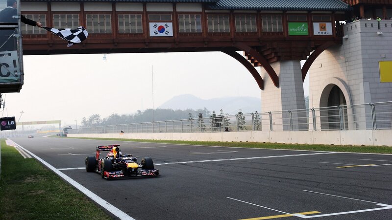 Formula One Car on Track — Black, Competitive, Afternoon