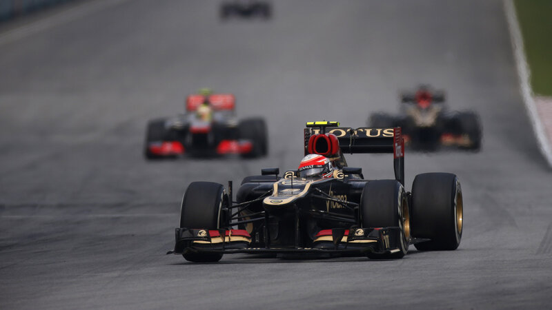 Formula One Car on Track — Black, Competitive, Photograph