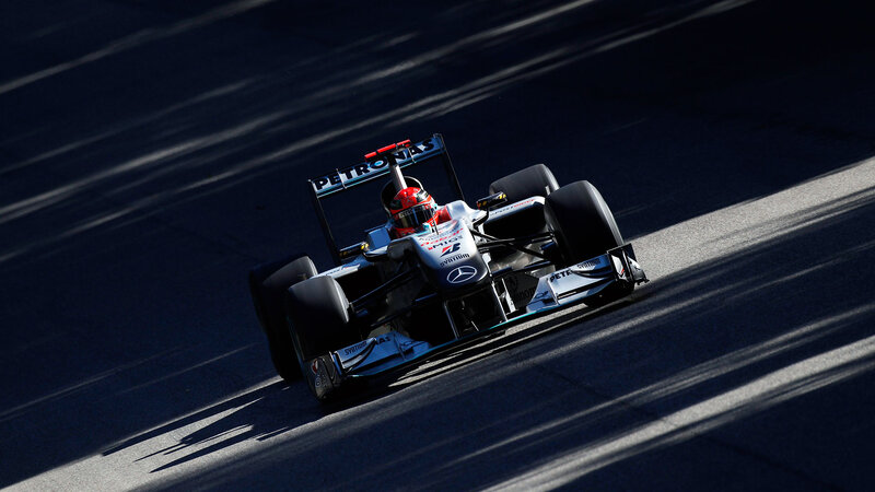 Formula One Car on Track — Black, Dramatic, Afternoon