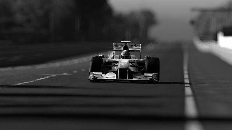 Formula One Car on Track — Black, Dramatic, Photograph, Driver, Race Track