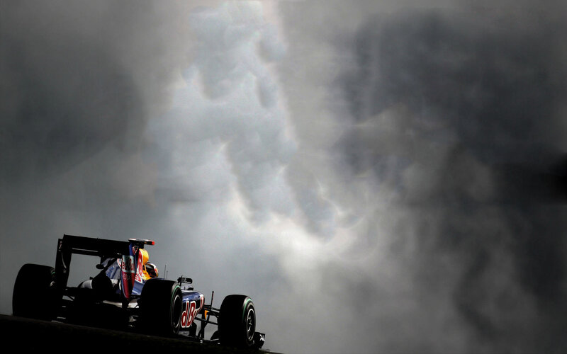 Formula One Car on Track — Black, Dramatic, Photograph