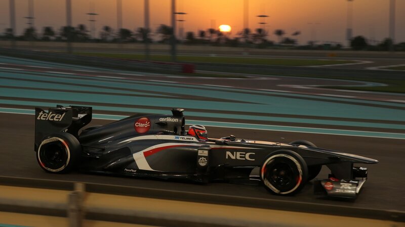 Formula One Car on Track — Black, Dramatic, Sunset, Photograph, Driver