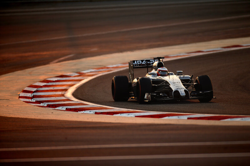 Formula One Car on Track — Black, Dramatic, Sunset, Photograph, Racing Driver