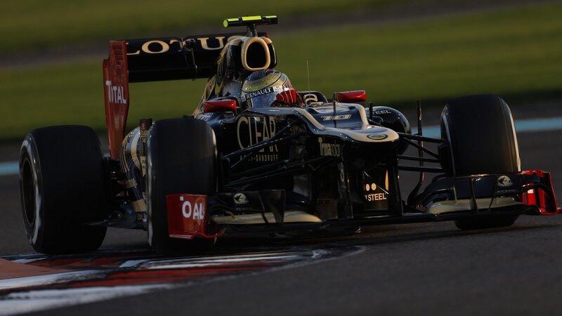 Formula One Car on Track — Black, Dramatic, Sunset, Photograph