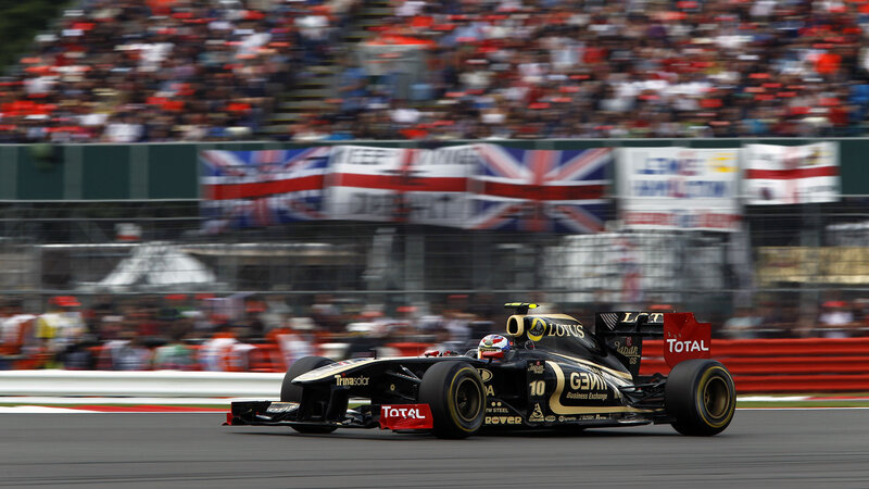 Formula One Car on Track — Black, Dynamic, Afternoon, Photograph, Crowd, Flag