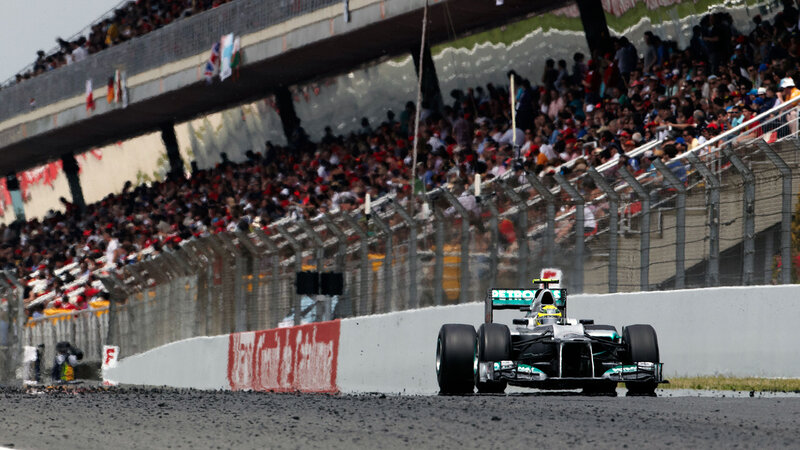 Formula One Car on Track — Black, Dynamic, Afternoon, Photograph, Crowd, Race Car