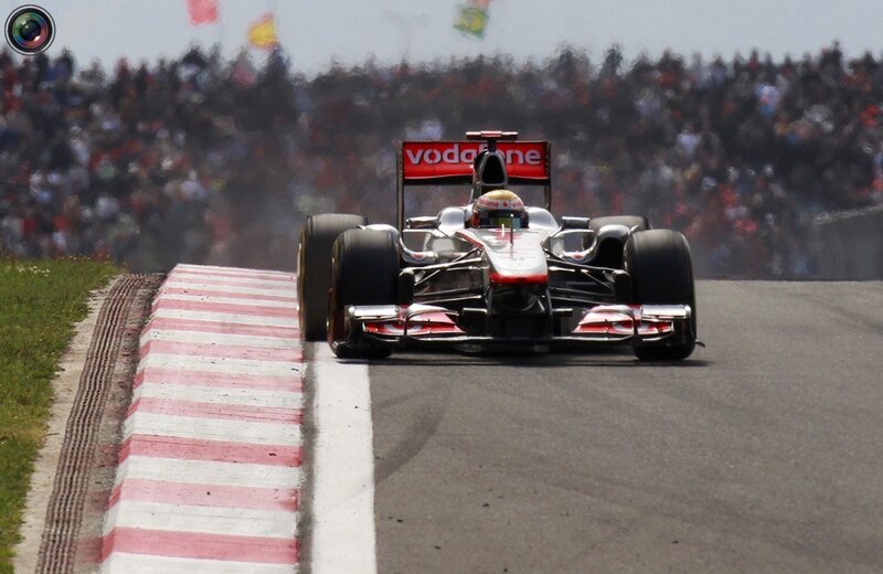Formula One Car on Track — Black, Dynamic, Afternoon, Photograph, Crowd, Race Car, White