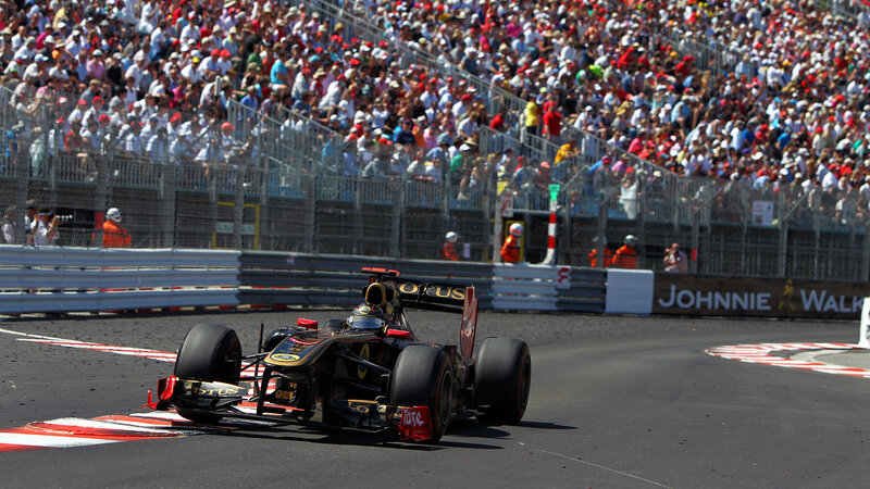 Formula One Car on Track — Black, Dynamic, Afternoon, Photograph, Crowd, Racing Car