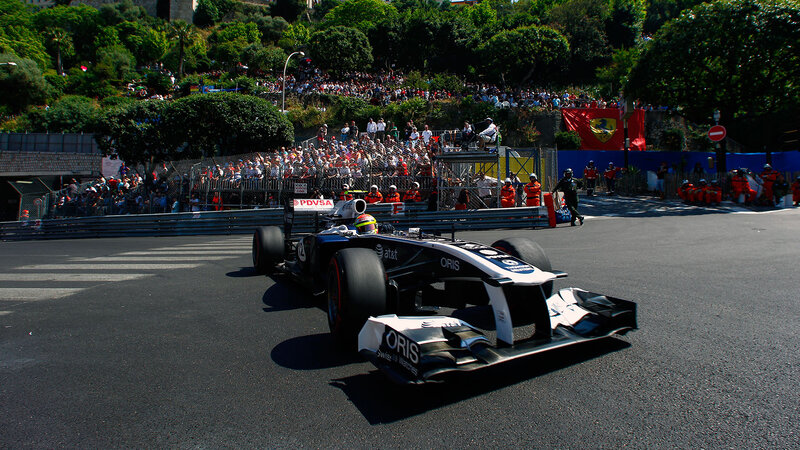 Formula One Car on Track — Black, Dynamic, Afternoon, Photograph, Crowd