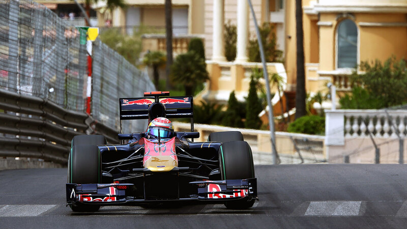 Formula One Car on Track — Black, Dynamic, Afternoon, Photograph, Driver, Fence, Building