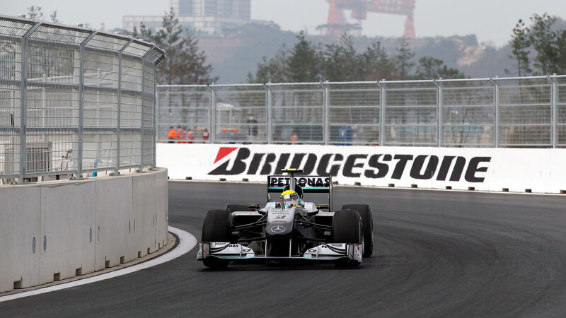 Formula One Car on Track — Black, Dynamic, Afternoon, Photograph, Driver, Fence, Trees