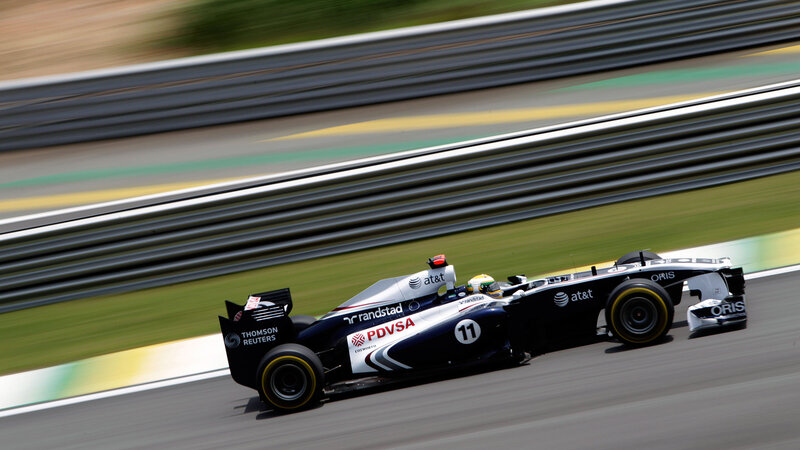 Formula One Car on Track — Black, Dynamic, Afternoon, Photograph, Driver, Race Car, Guardrail