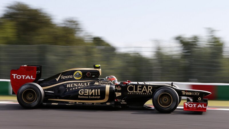 Formula One Car on Track — Black, Dynamic, Afternoon, Photograph, Driver, Race Car, Trees
