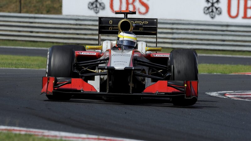 Formula One Car on Track — Black, Dynamic, Afternoon, Photograph, Driver, Racing Car, Grass