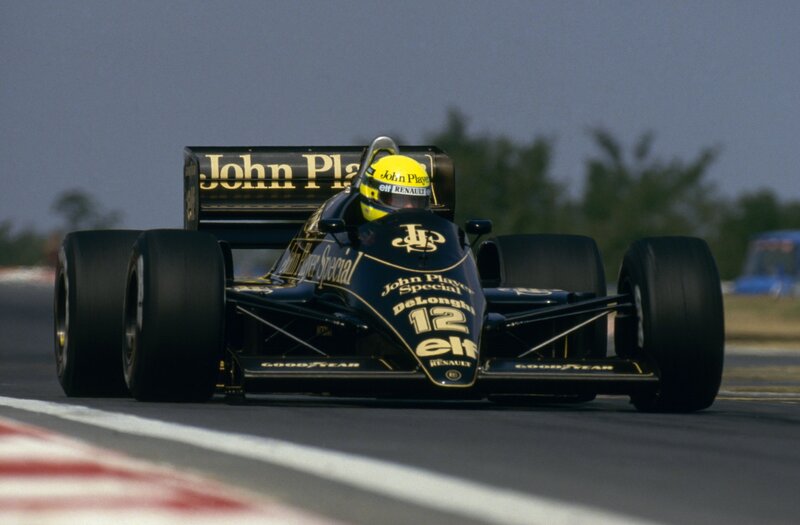 Formula One Car on Track — Black, Dynamic, Afternoon, Photograph, Driver, Racing Car