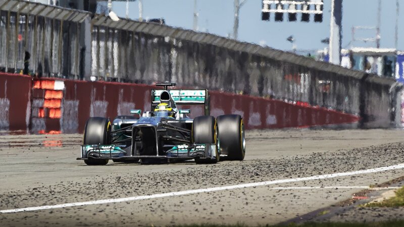 Formula One Car on Track — Black, Dynamic, Afternoon, Photograph, Driver, Racing Car, Wall