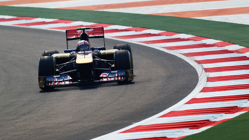 Formula One Car on Track — Black, Dynamic, Afternoon, Photograph, Driver, Racing Circuit, Tire
