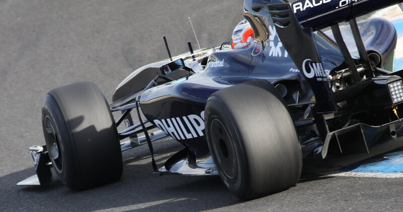 Formula One Car on Track — Black, Dynamic, Afternoon, Photograph, Driver