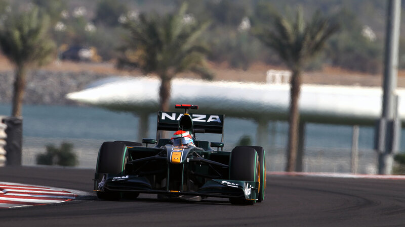 Formula One Car on Track — Black, Dynamic, Afternoon, Photograph, Palm Trees, Water