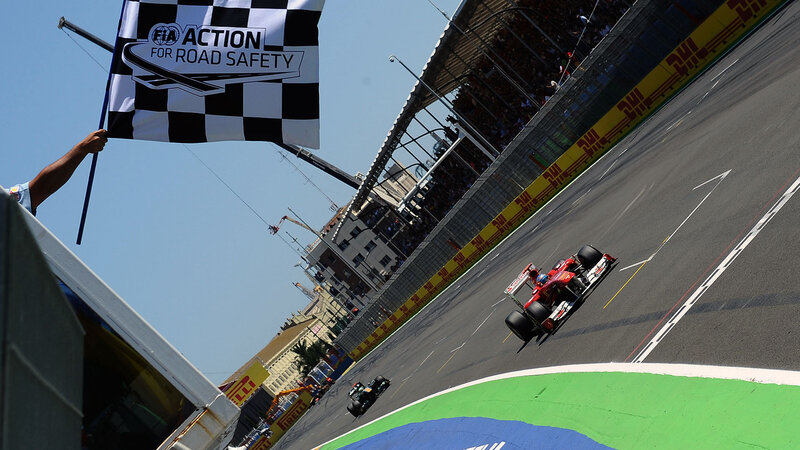 Formula One Car on Track — Black, Dynamic, Afternoon, Photograph, Race Car, Checkered Flag