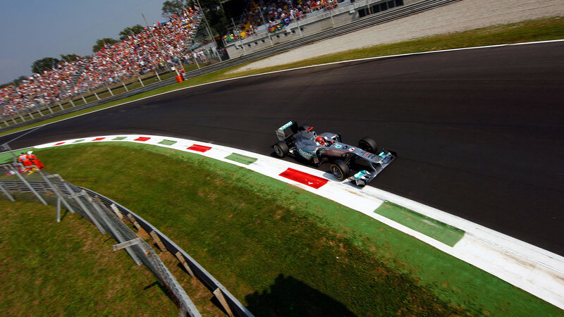 Formula One Car on Track — Black, Dynamic, Afternoon, Photograph, Race Car, Crowd