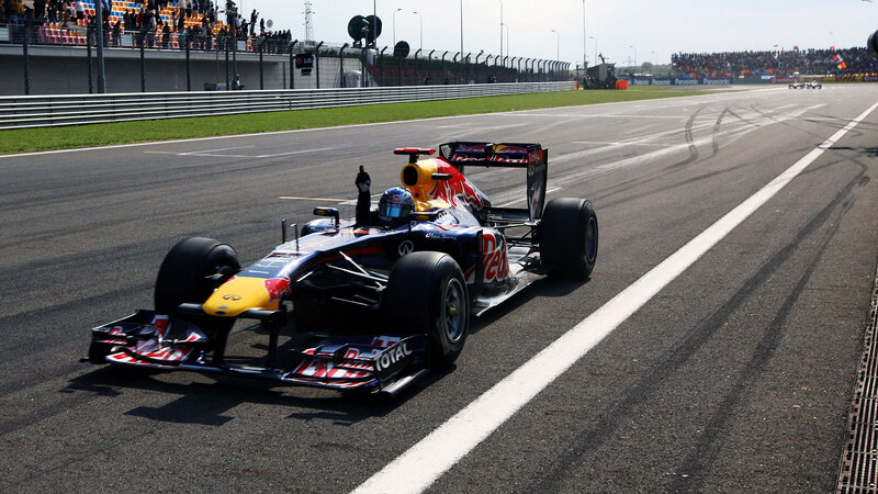 Formula One Car on Track — Black, Dynamic, Afternoon, Photograph, Race Car, Driver, Spectators