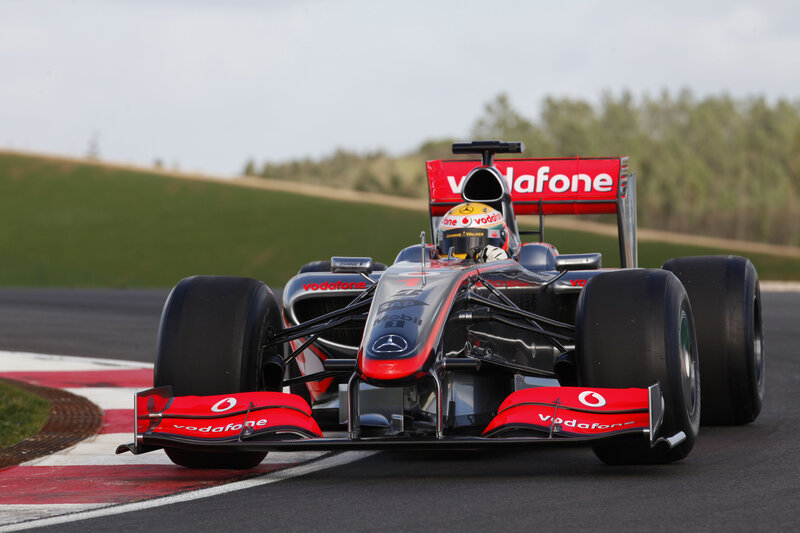 Formula One Car on Track — Black, Dynamic, Afternoon, Photograph
