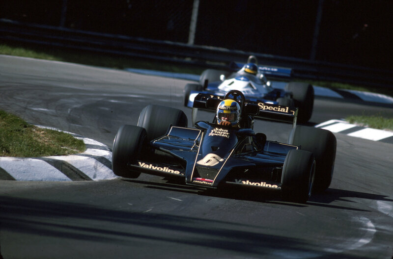 Formula One Car on Track — Black, Dynamic, Afternoon