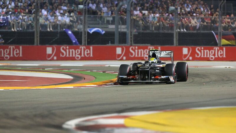 Formula One Car on Track — Black, Dynamic, Night, Photograph, Crowd