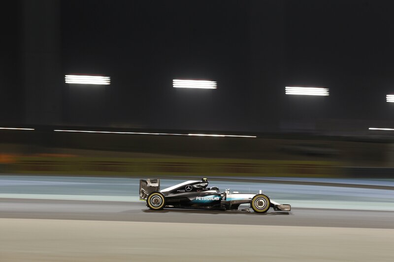 Formula One Car on Track — Black, Dynamic, Night, Photograph, Race Car, Lights