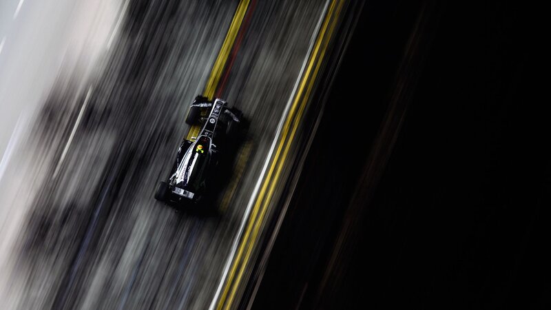 Formula One Car on Track — Black, Dynamic, Night, Photograph, Race Car, Yellow Lines