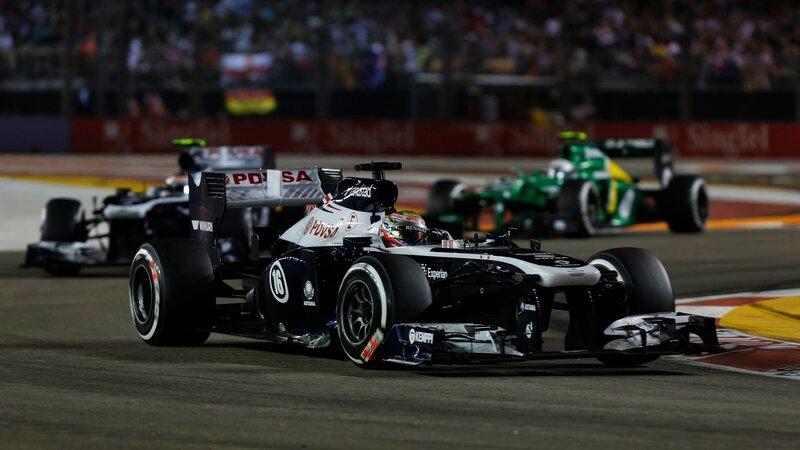 Formula One Car on Track — Black, Dynamic, Night, Photograph, Race Cars