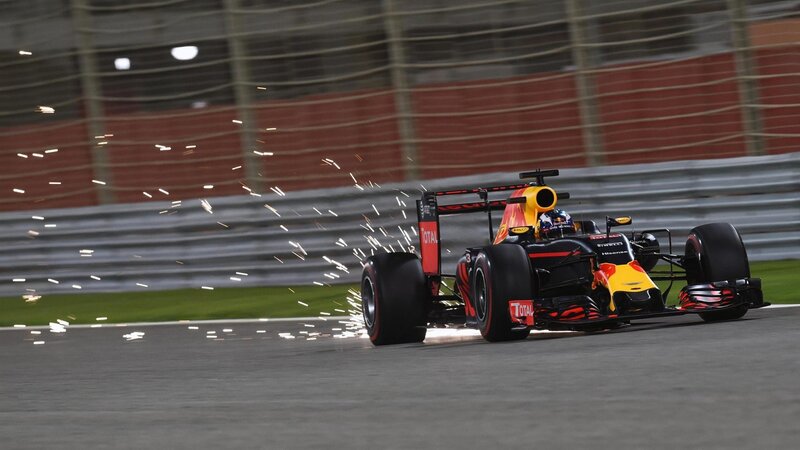 Formula One Car on Track — Black, Dynamic, Night, Photograph, Sparks