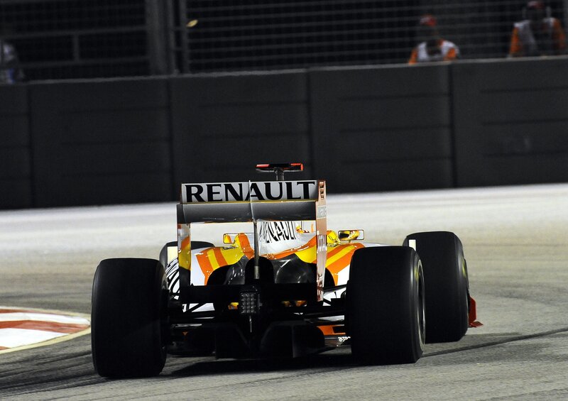 Formula One Car on Track — Black, Dynamic, Night