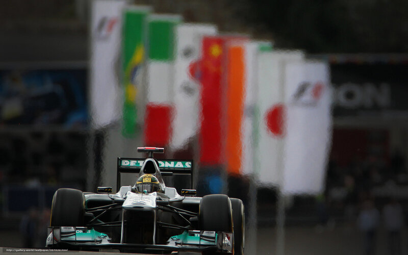 Formula One Car on Track — Black, Dynamic, Photograph, Driver, Flags